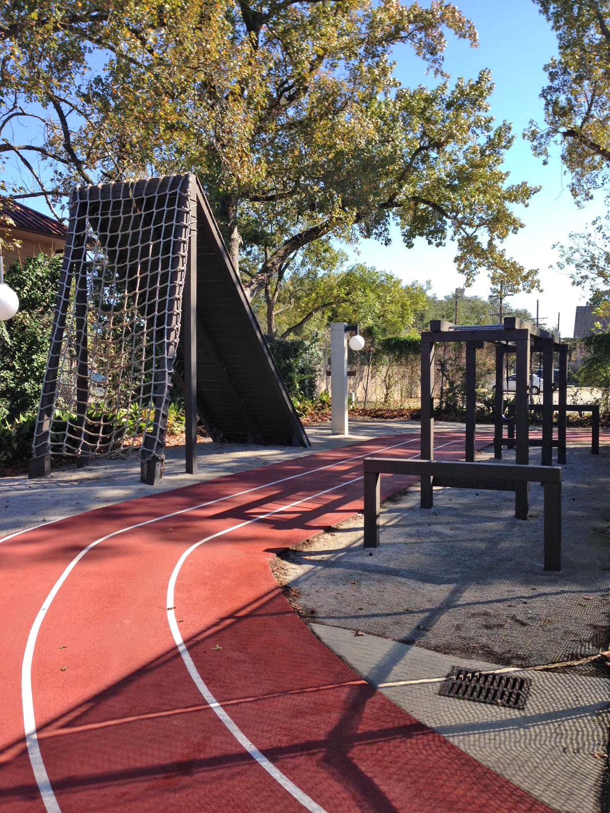 Boot camp obstacle course around the outdoor jogging track at Red's in Lafayette, La