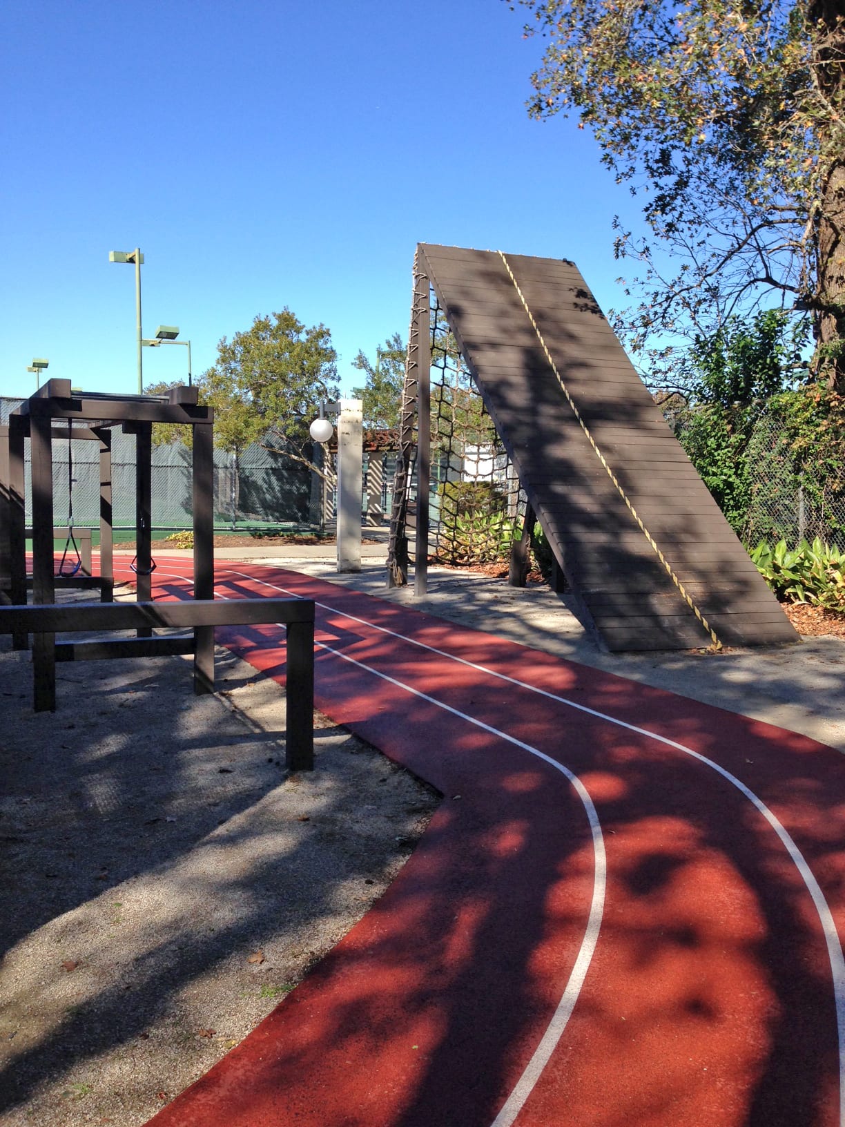 Boot camp obstacle course around the outdoor jogging track at Red's in Lafayette, La