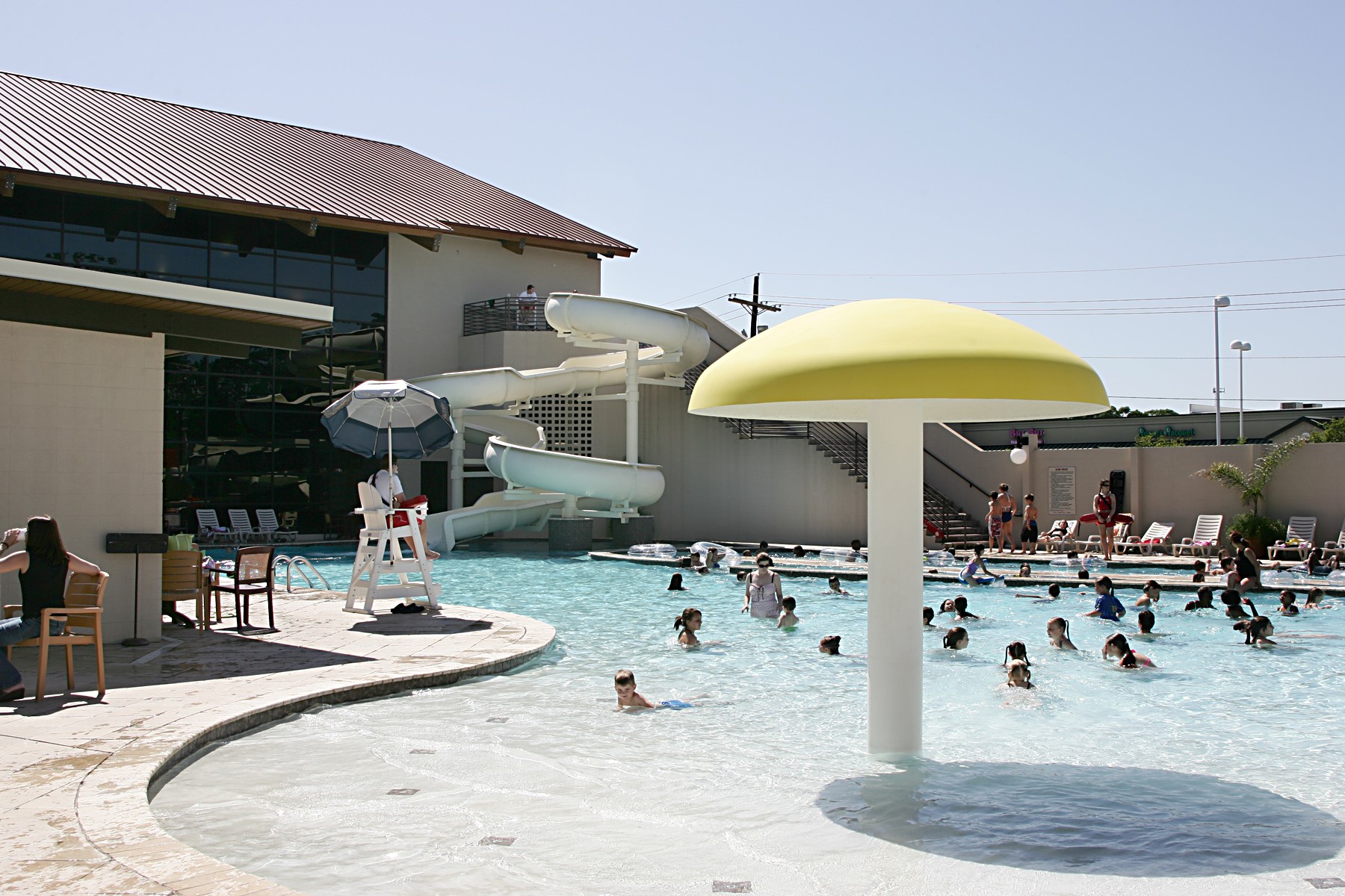 Kids zero entry pool with lazy river and water slide at Red's in Lafayette La