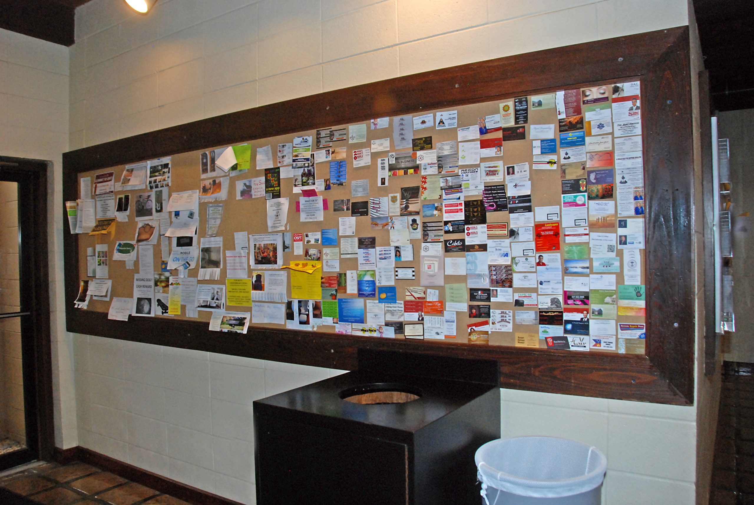Bulletin board at Red's in Lafayette, LA.